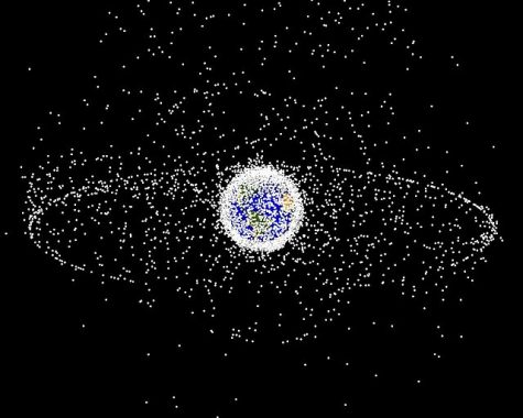 Debris plot by NASA.
A computer-generated image of objects in Earth orbit that are currently being tracked. Approximately 95% of the objects in this illustration are orbital debris, i.e., not functional satellites. The dots represent the current location of each item. The orbital debris dots are scaled according to the image size of the graphic to optimize their visibility and are not scaled to Earth. The image provides a good visualization of where the greatest orbital debris populations exist.

This image is generated from a distant oblique vantage point to provide a good view of the object population in the geosynchronous region (around 35,785 km altitude). Note the larger population of objects over the northern hemisphere is due mostly to Russian objects in high-inclination, high-eccentricity orbits.